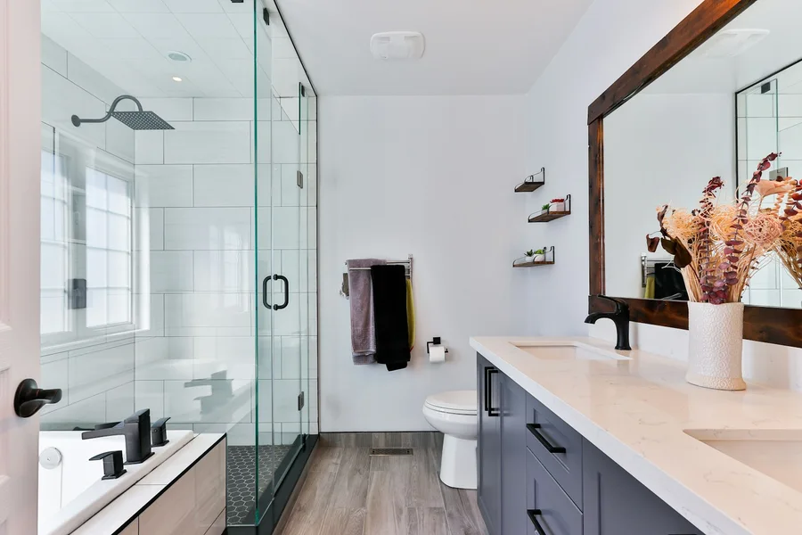 Bathroom with warm timber vanity and natural textures