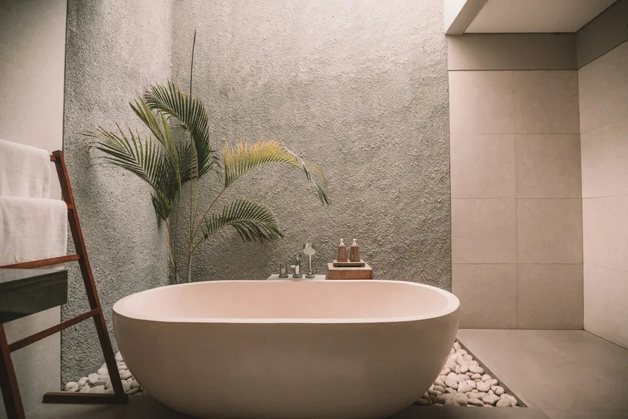 Bathroom design with warm surfaces and simple fittings